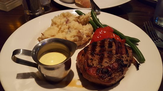 The Keg Steakhouse signature dishes Filet MignonPrime RibLobster Tail Dinner